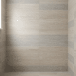 Refinished bathroom wall tiles with a smooth, clean finish in a contemporary bathroom for tile refinishing and bathtub repair services